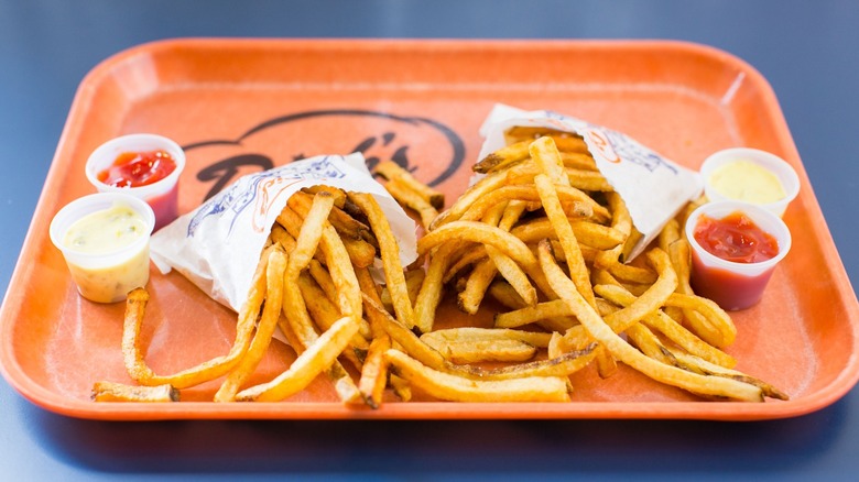 Orange tray with Dick's Drive-In fries