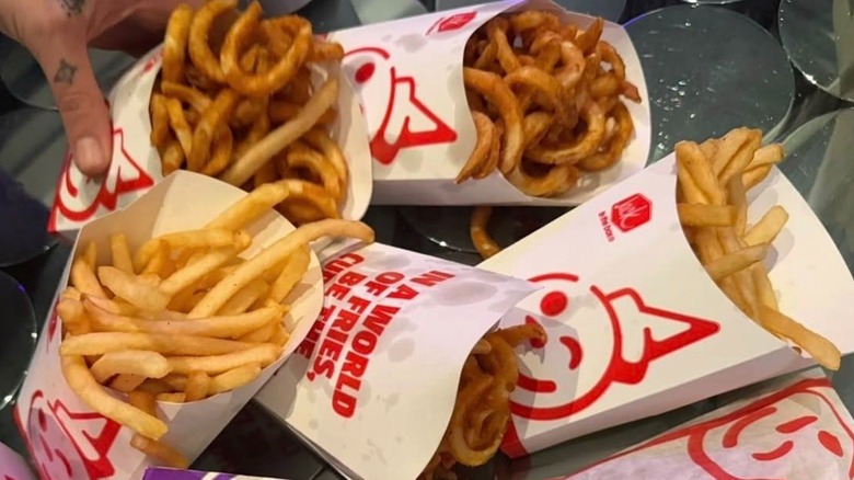 Several boxes of Jack in the Box fries