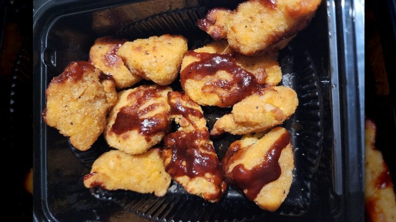 Papa John's boneless wings with a drizzle of sauce