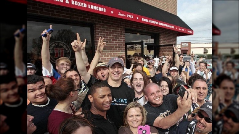 Drew Brees, fans in front of Jimmy John's