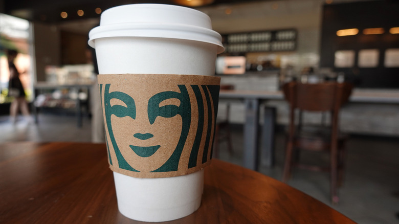 Starbucks cup on table