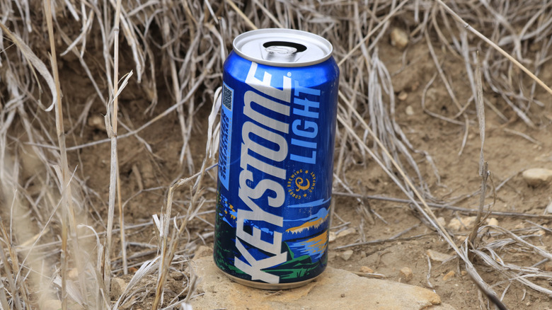 A can of Keystone Light on the ground