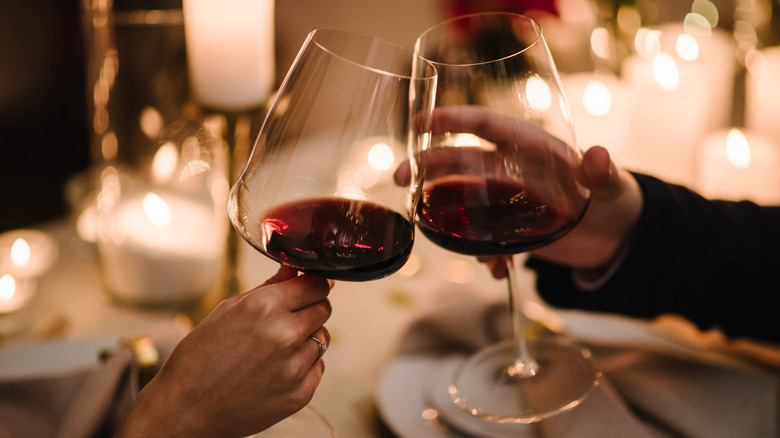 Glasses of wine clinking