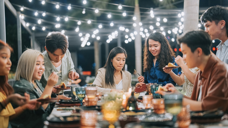 People eating at Chinese restaurant