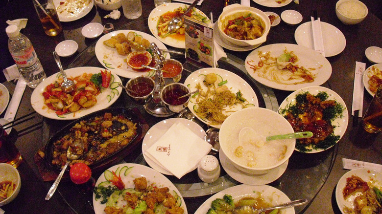 Leftover Chinese food on a restaurant table