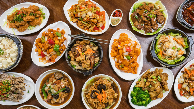An array of Chinese dishes on table