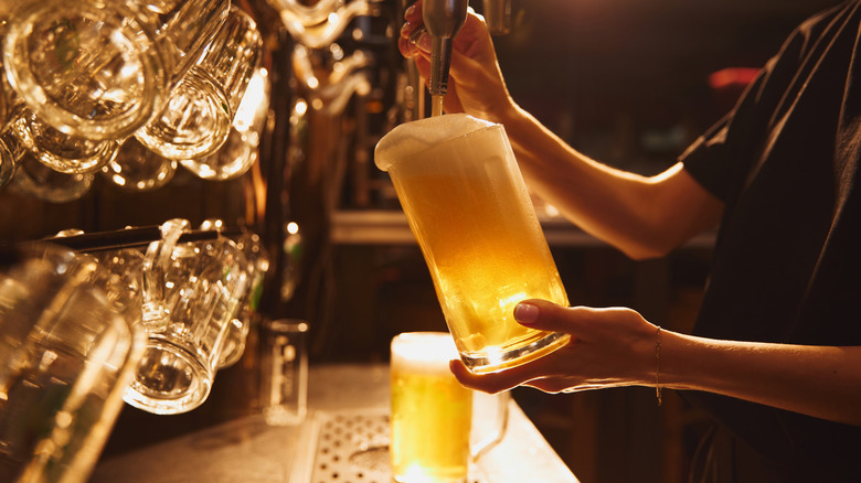 bartender pouring beer
