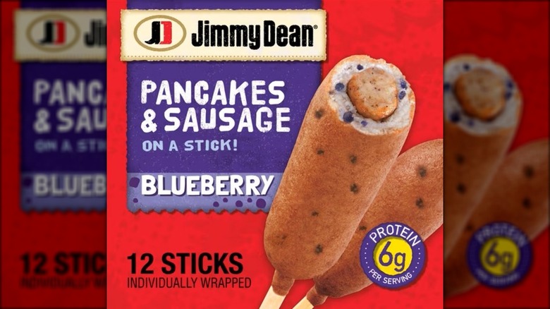 Package of blueberry pancake-wrapped sausages on a stick.