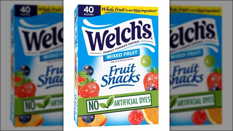 Box of packaged fruit snacks in various flavors.