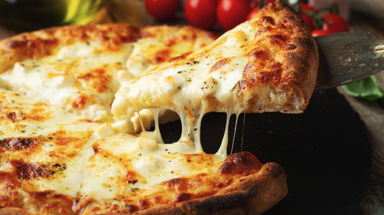 cheesy pizza with slice