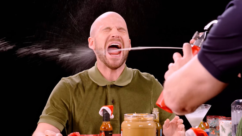 Gordon Ramsay spraying Sean Evans