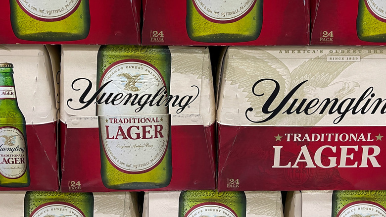 Cases of Yuengling Traditional Lager stacked on top of each other