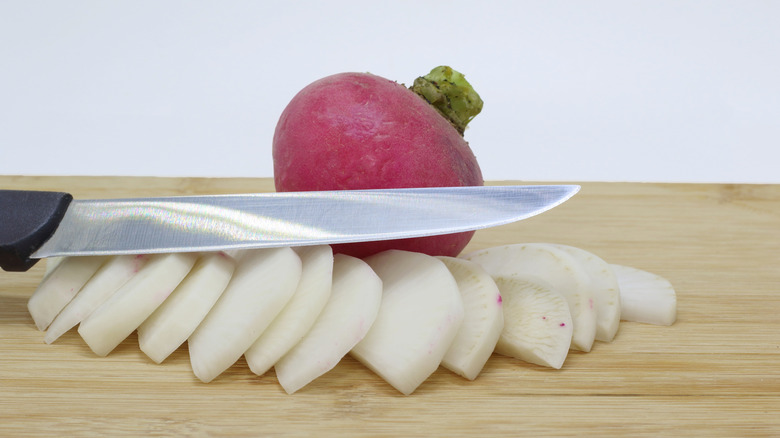 sliced turnips on cutting board