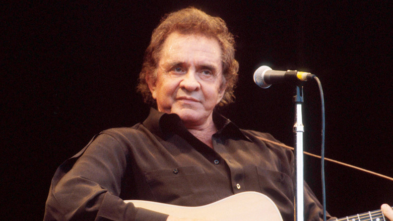 Johnny Cash performing onstage
