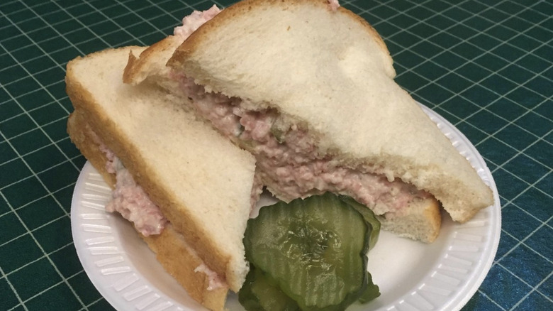 Sliced bologna salad sandwich with pickles