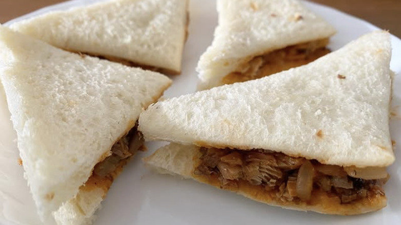 Sardine sandwiches with crust cut off