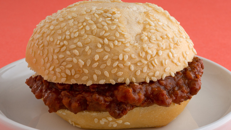 Closeup of Sloppy Joe with red background