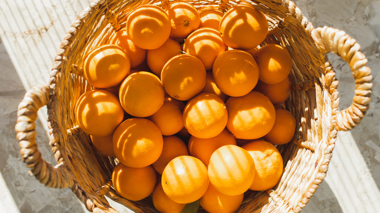 wicker basket full of oranges