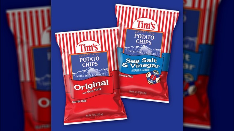 Bags of Tim's Cascade potato chips on a blue background