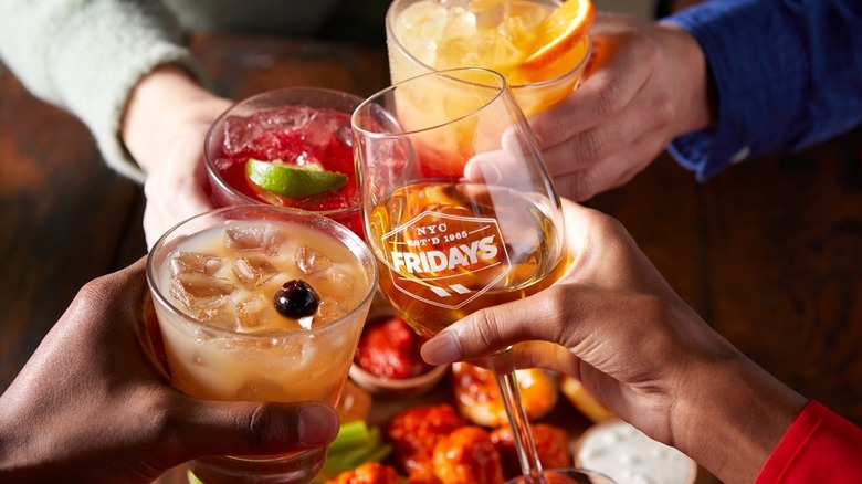 TGI Fridays wine glass clinking other alcoholic drinks