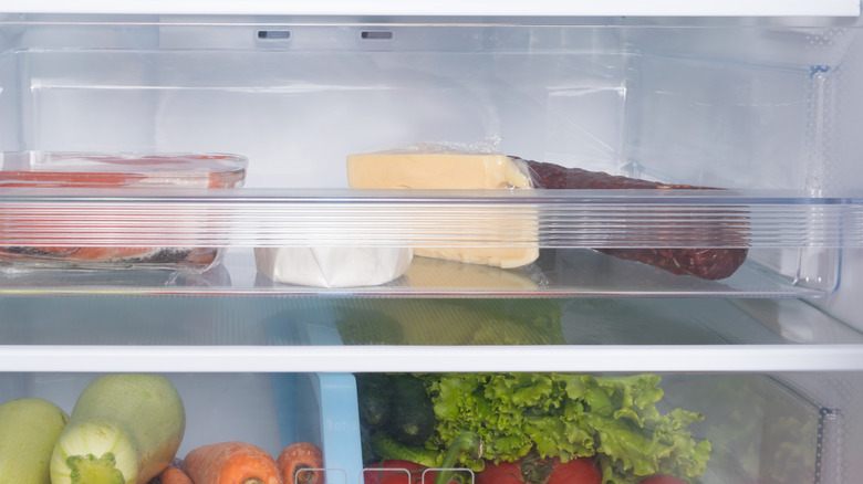 Cheese in crisper drawer in fridge