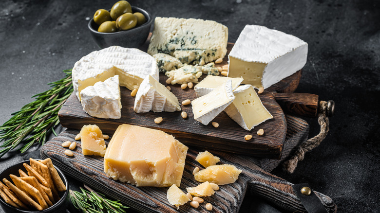 Various cheeses on cheese boards