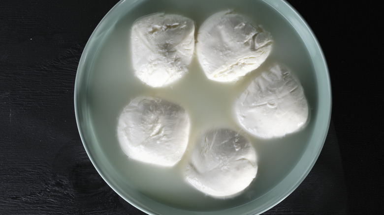 Balls of fresh mozzarella in liquid