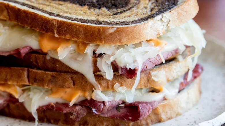 Rye swirl sandwich with sauerkraut, meat, and cheese