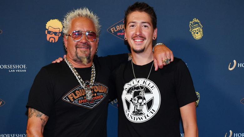 Guy Fieri with son Hunter wearing Flavortown and Knuckle Sandwich shirts