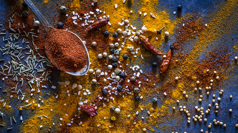Top view of colorful whole and ground spices