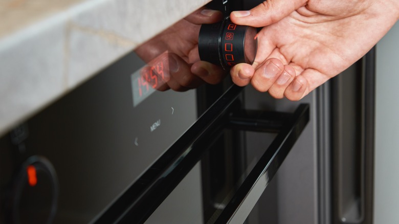 Hand setting oven temperature