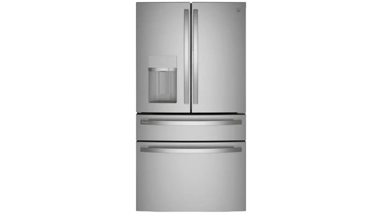 French door stainless steel refrigerator with double freezer drawers on a white background