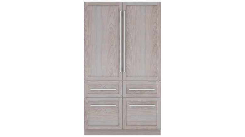 French door refrigerator with wood panels and silver hardware