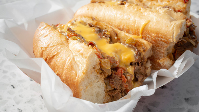 Phily cheesesteak with Cheez Whiz on deli paper