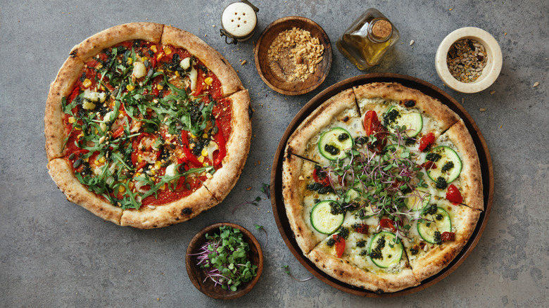 two homemade pizzas