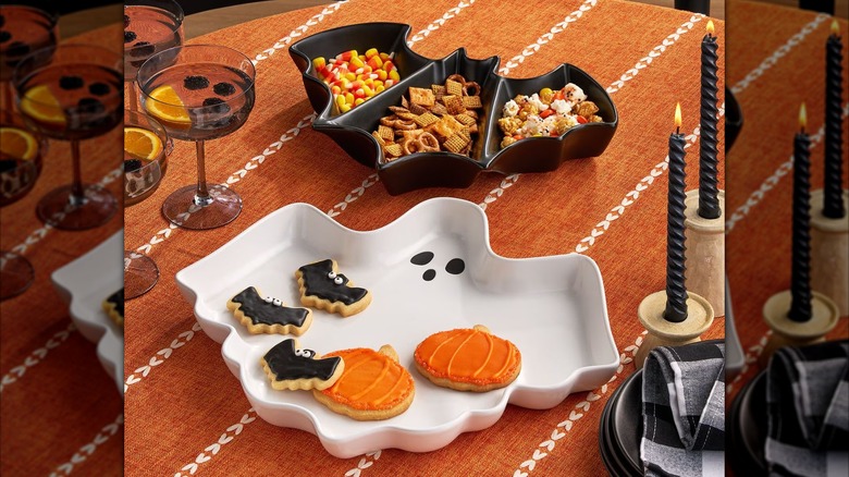Halloween serving trays in the shape of ghosts and bats.