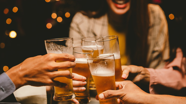 people drinking draft beer