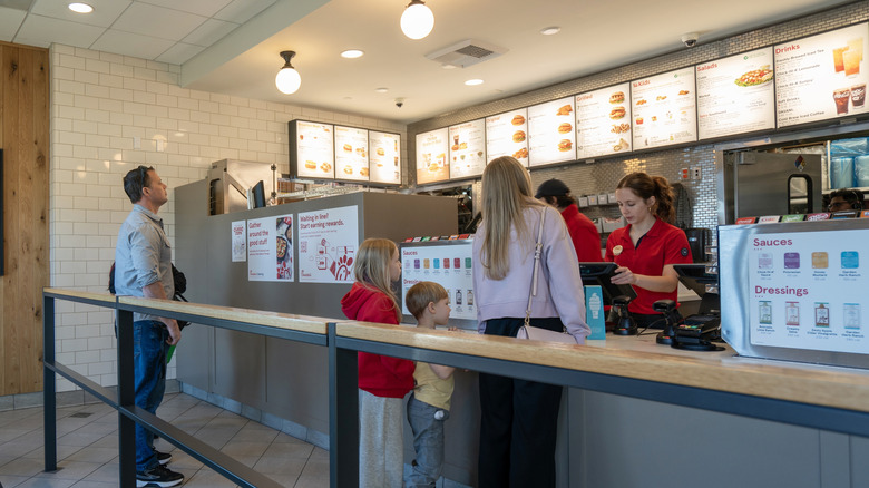 Chick-fil-A cashier taking orders