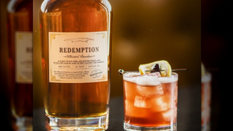Bottle of Redemption Wheated Bourbon with cocktail