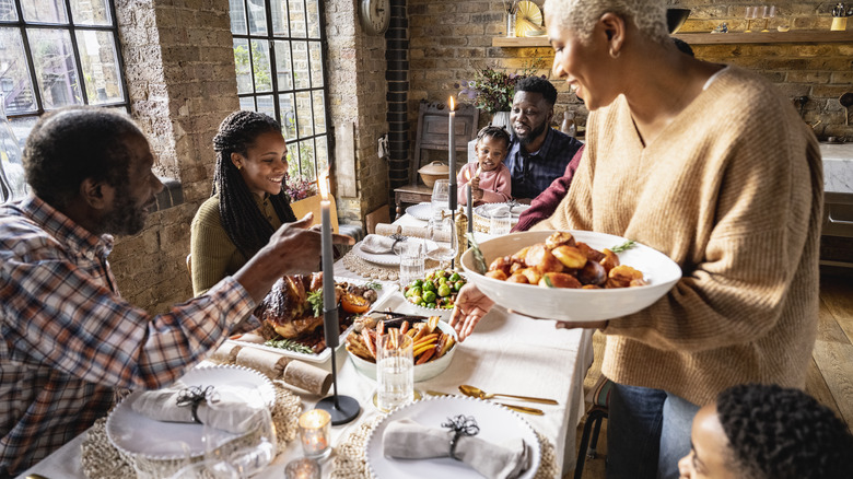 Family at table for Christmas dinner