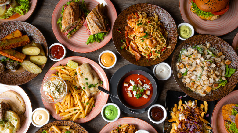 array of restaurant dishes on table