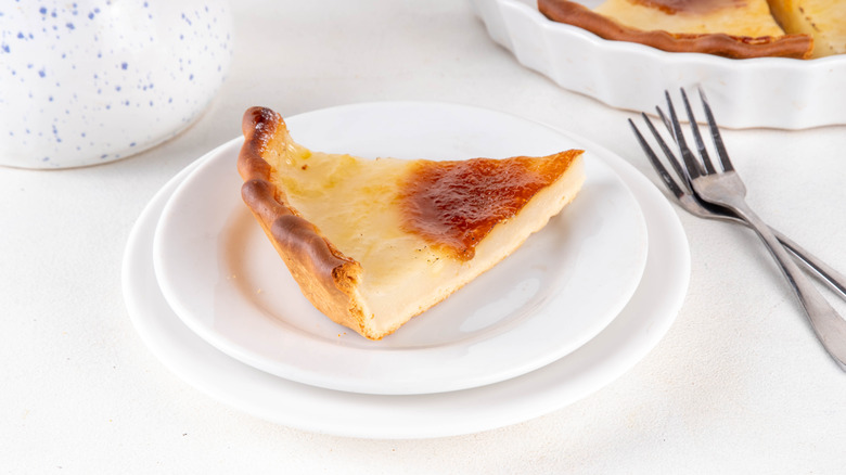 water pie on a white plate with silverware