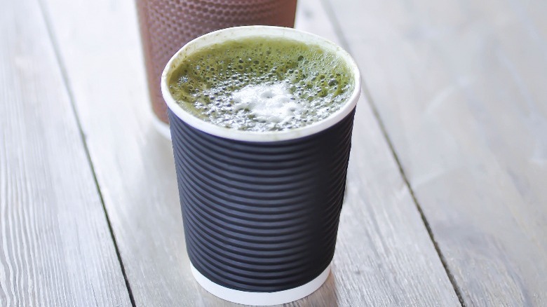 A matcha latte in a cup