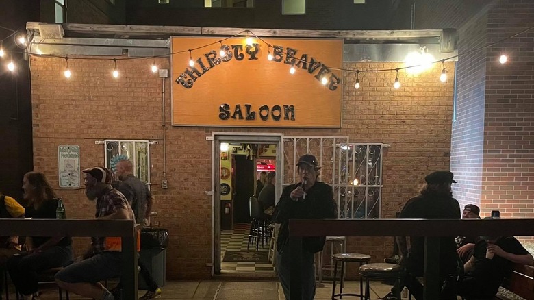 Mick Jagger outside the Thirsty Beaver Saloon