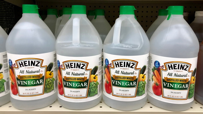 grocery shelf with white vinegar