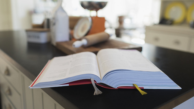 cookbook open on kitchen counter