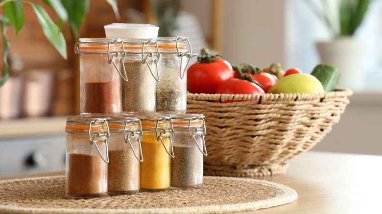 jars of ground spices on counter