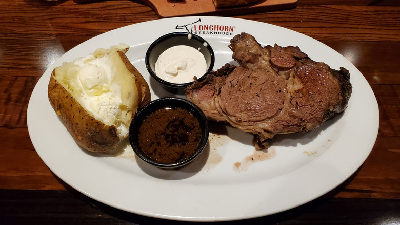 Steak and baked potato at LongHorn Steakhouse