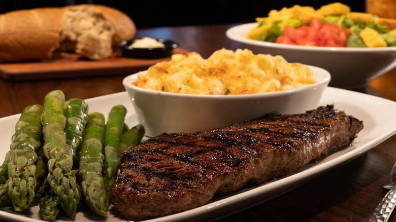 Longhorn steakhouse bread in the background