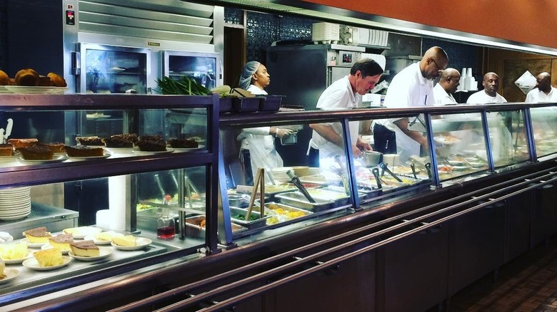 Workers preparing food at Niki's West
